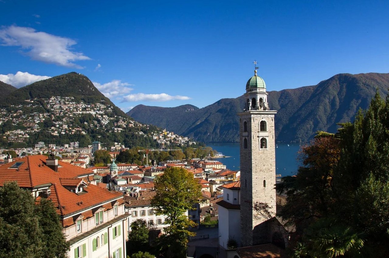 Blick auf Lugano und die Kirche San Lorenzo. (Symbolbild Pixabay)