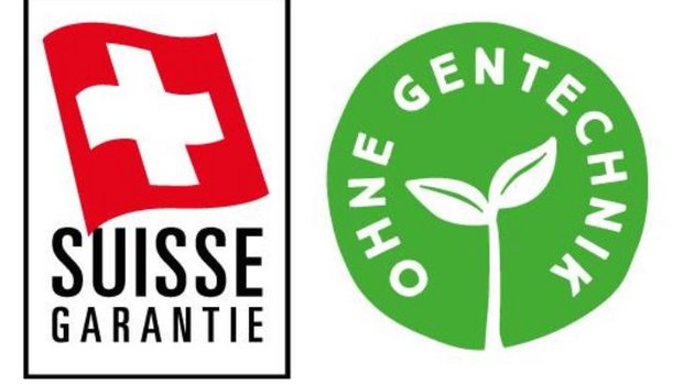 Suisse-Garantie-Gütesiegel und das «Ohne Gentechnik»-Label. (Bild AMS)