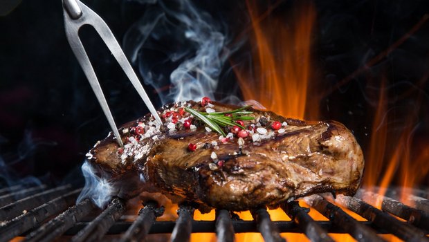 Beef steak on the grill.